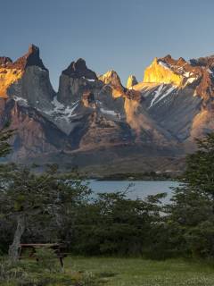 The image shows the spiky mountain peaks of Cuernos del Paine at Torres del Paine National Park, Chile.