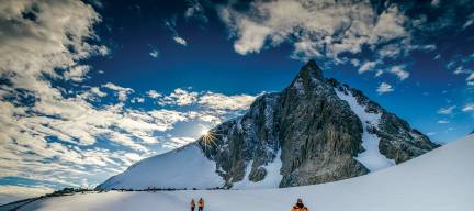 Passengers hiking in Antarctic Landscape
