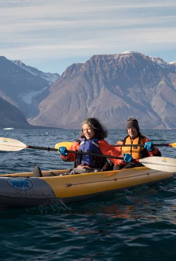 Passengers enjoying the paddling excursion experience