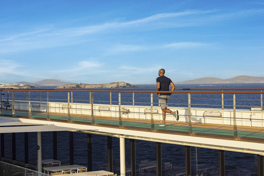 Guest running on track on wraparound deck